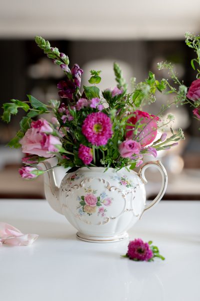 Romantic Flower Arrangement in Antique Teapot